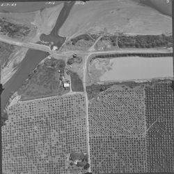 Aerial views of earthen bridge across Dry Creek near Skinner Road