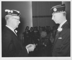 Presentation of gold life membership card to Walter H. Mansfield during installation of new officers Petaluma Post no. 28 at the Petaluma War Memorial Building, Petaluma, California, June 9, 1964