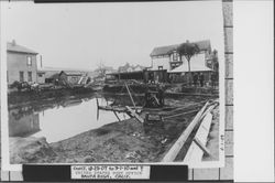 Post Office excavation site filled with water, Santa Rosa, California, 1909