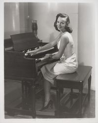 Diane Romero at the organ, Santa Rosa, California, 1957