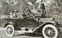 Henry Raymond and family out for a ride in his first car, Petaluma, California, 1912