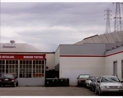 C Street view of the former Auto World Building at 115 Petaluma Blvd. South and a portion of former Heyward & Young Flying A Service Station, Petaluma, California, Sept. 25, 2001