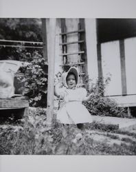 Kay Minette Evans poses in the back yard on Easter Sunday in Petaluma, California, 1949