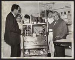 Admiring a cart of medical equipment and supplies