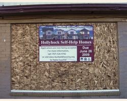 Sign for Hollyhock Self-Help Homes, 961 Gravenstein Highway South, Sebastopol, Calif., June 19, 2009