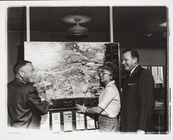 Members of the Chamber of Commerce looking at an aerial map of Santa Rosa, California, 1963