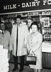 Jack and Mary Dei with an unidentified man standing in an unidentified Cleveland, Ohio store, February 1978