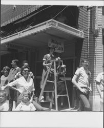 Watching the parade at Midge's Beauty Salon, Petaluma, California, 1955