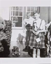 Bonnie and Bill Alwes with their entries to the Santa Rosa Pet and Doll Parade, 815 Beaver Street, Santa Rosa, California, 1955