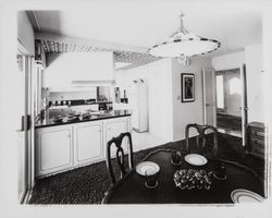 Kitchen and dining room of a model home, Santa Rosa, California, 1967