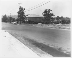 Unidentified single-story home in southwest Santa Rosa, California, with Bennett Mountain in the background, 1950s or 1960s