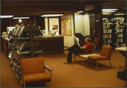 View of the Circulation Desk and periodical shelving at the Sebastopol Branch Library