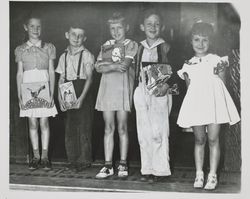 Five children at Petaluma Carnegie Library for Book Week, 20 Fourth Street, Petaluma, California, 1939