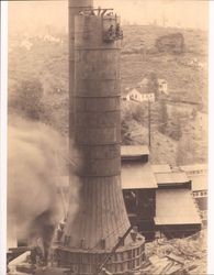 Construction in progress of smoke stack at an unidentified Northern California lumber mill, about 1915