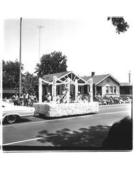 Float with unidentified young women in the Sonoma-Marin Fair Parade of July 1965 in Petaluma