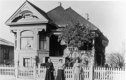 Posing outside a Mendocino Avenue home