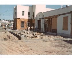 Contractors completing foundation work on an addition to the Petaluma Fire Department in Petaluma, California, 1970