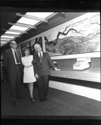 Clinton Carlson, Ruth Dicker and John P. Long admiring Ms. Dicker's paintings at grand opening of Bank of Sonoma County, Santa Rosa, California, March 19, 1973