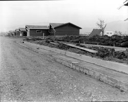 Street and curb grading in Rincon Valley Homes subdivision in the Mission Blvd.-Yukon Drive area