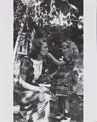 Mary and Bonnie Alwes wearing matching dresses, Santa Rosa, California, 1950