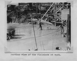 Men finishing the basement floor of the Poultry Producers of Central California mill, Petaluma, California, about 1937