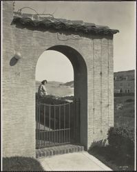 View through the arched entry way at 98 Sea Cliff Avenue, San Francisco, California, 1920s