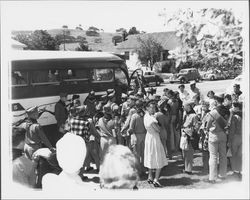 Boy Scouts embarking on a bus, Petaluma, California, 1940