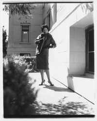 Worsted wool coat and fur stole modeled at the Sonoma County Courthouse, Santa Rosa, California, 1959