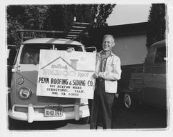 Fleet of Volkswagen vans and cars belonging to Penn Roofing and Siding Co., Sebastopol, California, 1962