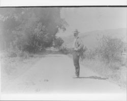 Man standing in road in Novato, California, Sept. 6, 1903