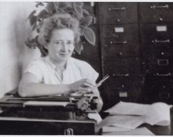 Charlotte S. Merry at her desk, Petaluma, California, in the 1950s