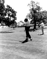 Golfers at opening day at Oakmont Golf Course