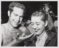 Chuck Hurst and chipmunk at the Sonoma County Fair, Santa Rosa, California, 1957