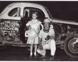 Lloyd Silacci with his racing car, 800 Petaluma Boulevard South, Petaluma, California, in the 1950s