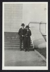 Rev. Charles R. Drake and Joyce Drake standing at the foot of a brick stairway in San Francisco, California, 1922