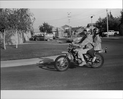 Unidentified people on motorcycles in Petaluma, California, 1973