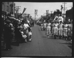 Marching units of women and girls in the Rose Parade