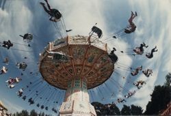 Carnival goers fly through the sky at the Sonoma County Fair, Santa Rosa, California