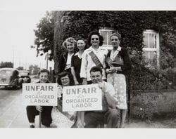 Group of striking workers of the Sunset Line and Twine Company picket in front of the plant in Petaluma, California, 1947