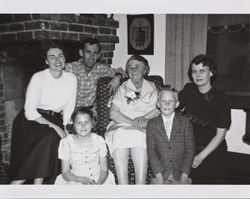 Alwes and McGregor families pose for a photograph at Dagny Juell's house on Easter, Santa Rosa, California, about 1956