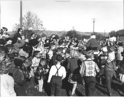 Children crowded around Santa at McNear Park, Petaluma, California in 1948