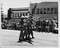 Two Rock Honor Guard marching past the grandstand in a Petaluma parade, about 1964