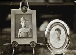 Framed portraits on a table of Herbert Cochrane and Edith Raymond, about 1917