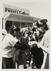 Girls love funnel cakes at the Sonoma County Fair, Santa Rosa, California, about 1993