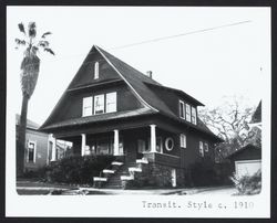 Transitional Style home with large, triangular pediment