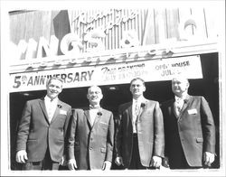 Four men standing in front of Redwood Empire Savings and Loan, Petaluma, California, about 1958