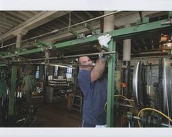 Russell Strickland working on a machine bar, Sunset Line & Twine Company in Petaluma, California, Dec. 5, 2006