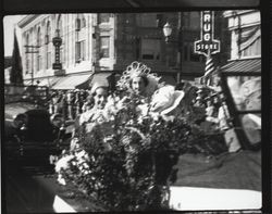 Rose Queen Juliet Proctor riding in the parade