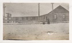 Collecting snowballs in front of the Petaluma and Santa Rosa Railway Powerhouse on Main Street, Sebastopol, January 6, 1907