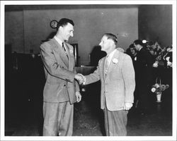 Charles Reinking shaking hands with an unidentified man, Santa Rosa, California, 1965